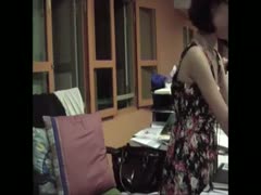 A petite Asian office hotwife shows off her physique and takes off her clothes.